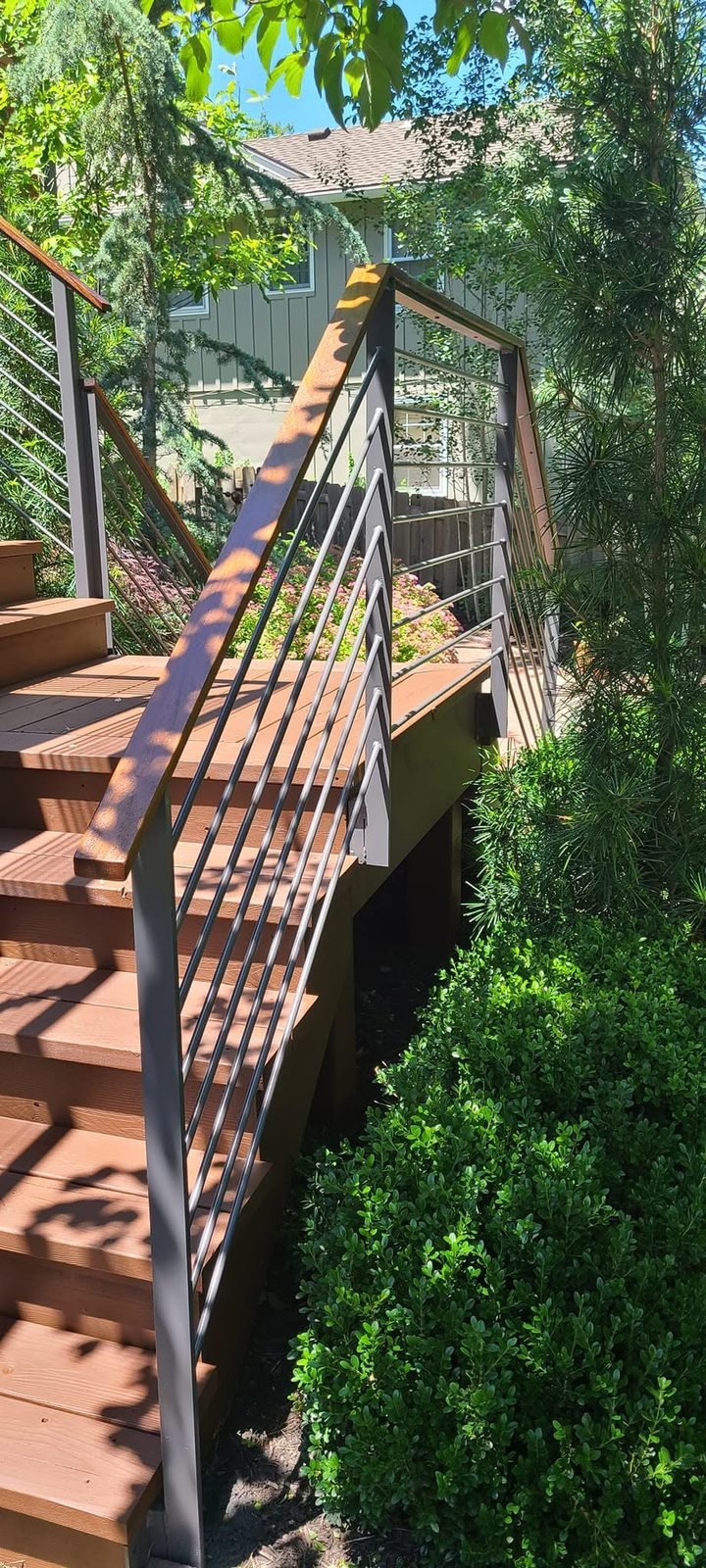 Deck stairs and railing after refinishing