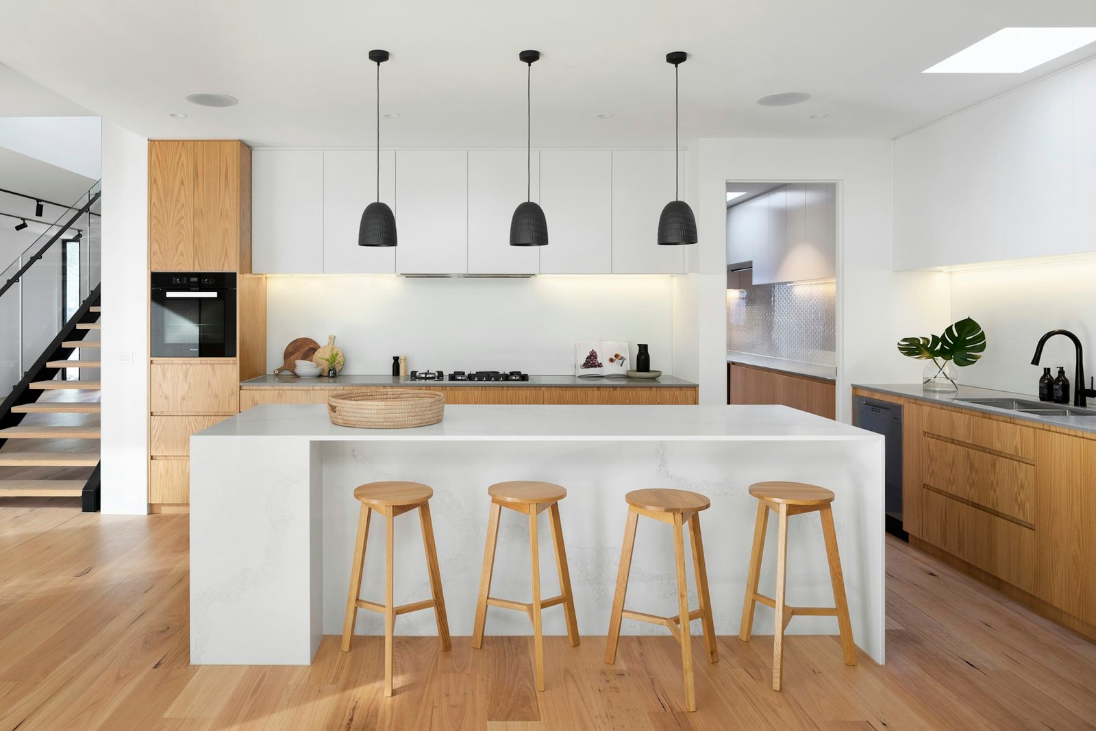 Renovated kitchen with quartz counters